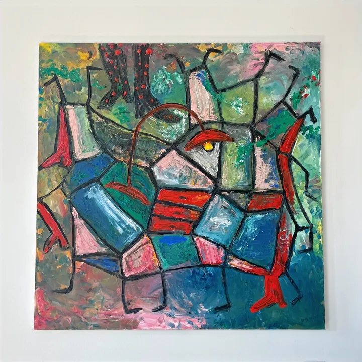 Painting: a creature-like chair made of blue, green and pink patches outlined in black, with a red leg and a yellow eye.